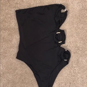 Strapless black body suit